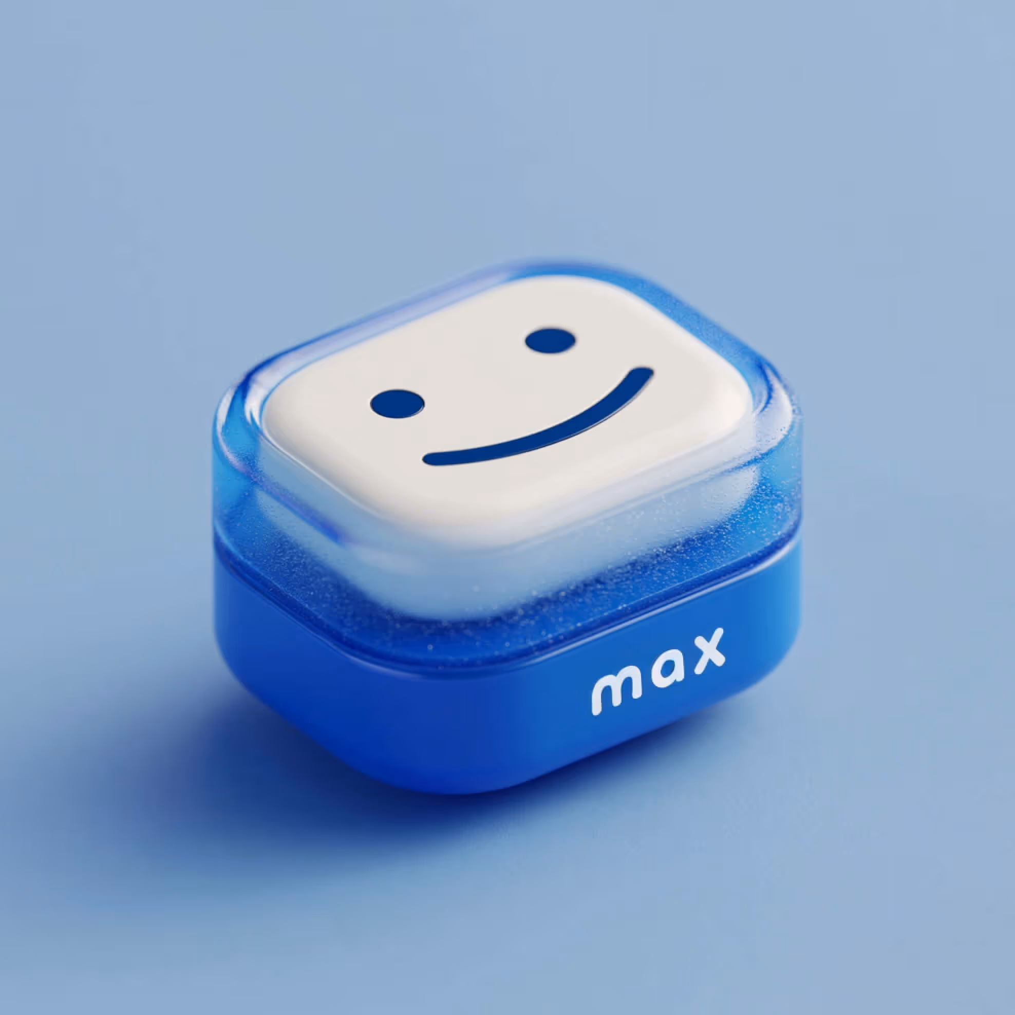 Blue square container with a translucent lid featuring a smiling face and the word 'max' on the side.