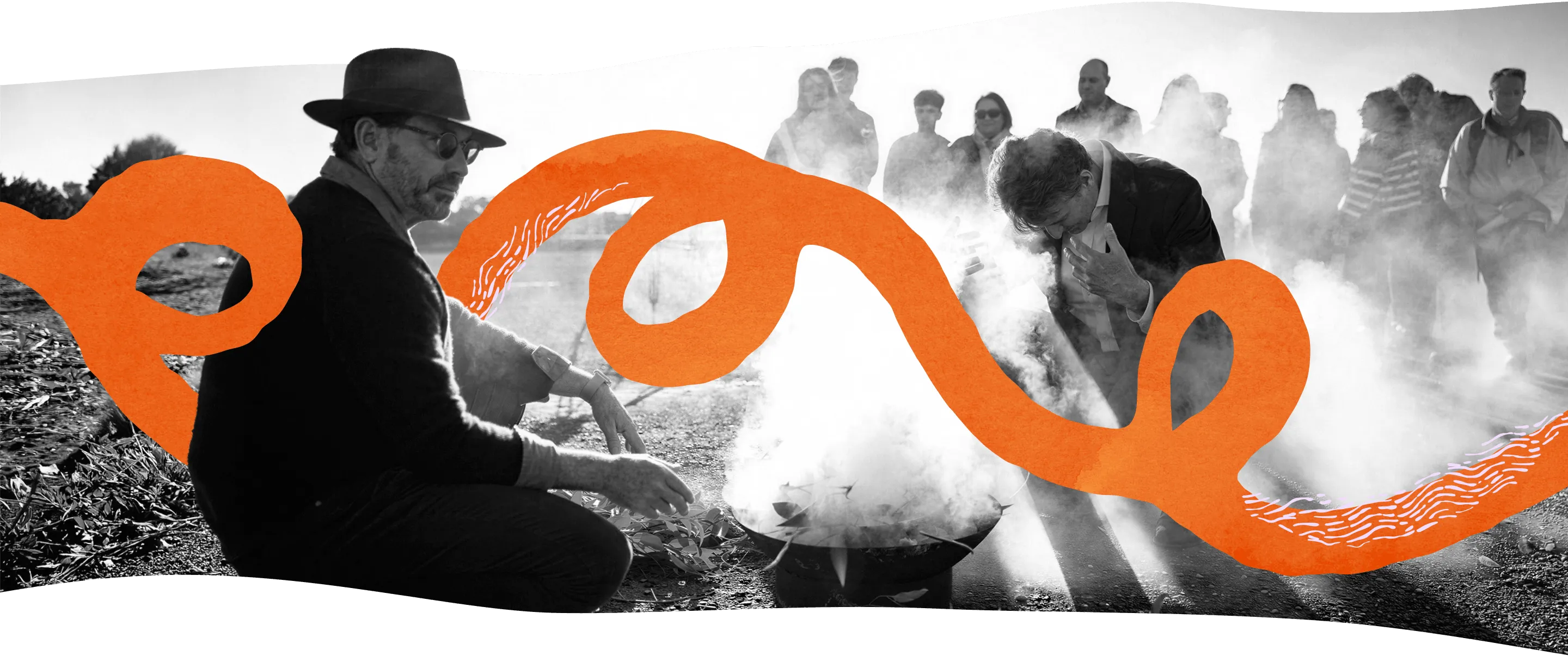 Community members gathered, overlaid with Indigital's orange swirl graphic — black-and-white photograph