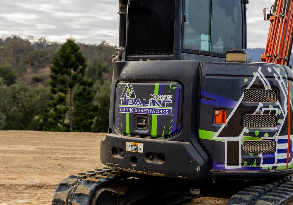Balint Building & Earthworks excavator showcasing earthmoving equipment in Warwick QLD