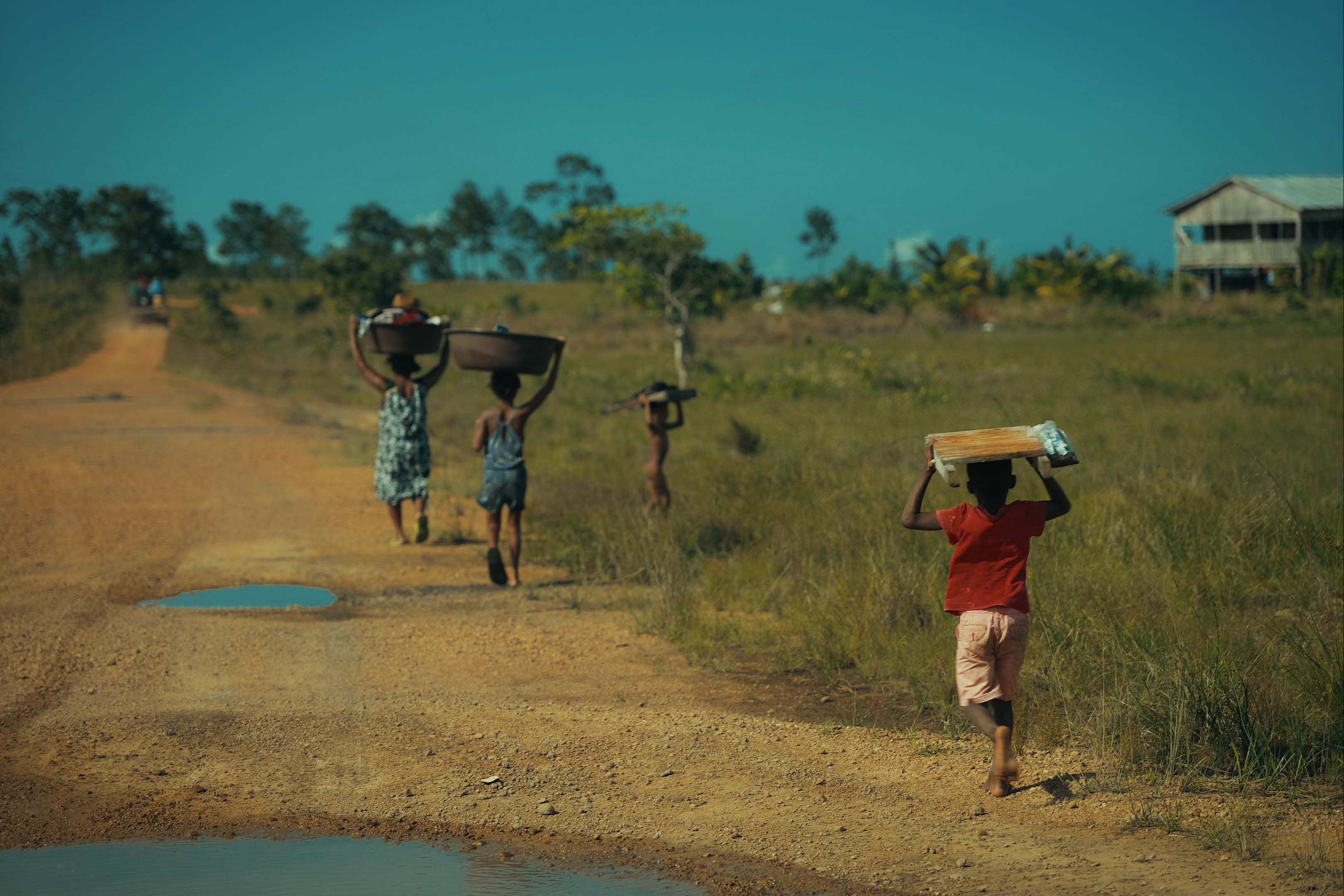 Children walking along the road