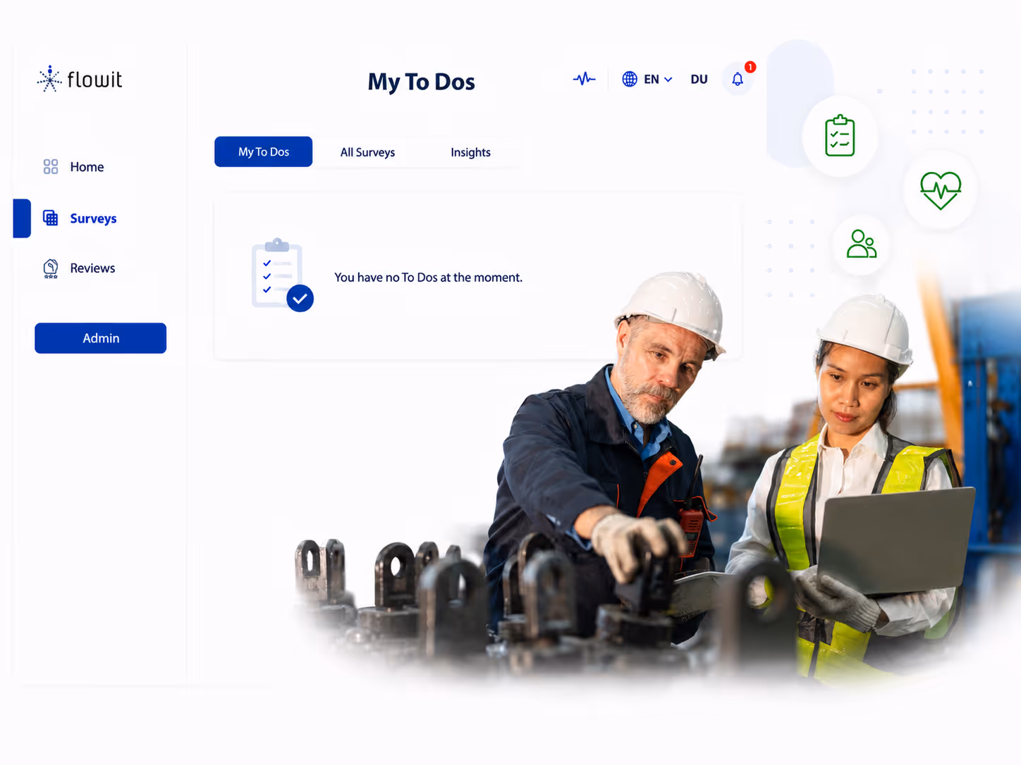 Two workers with hard hats and safety vests inspecting machinery and using a laptop on site.