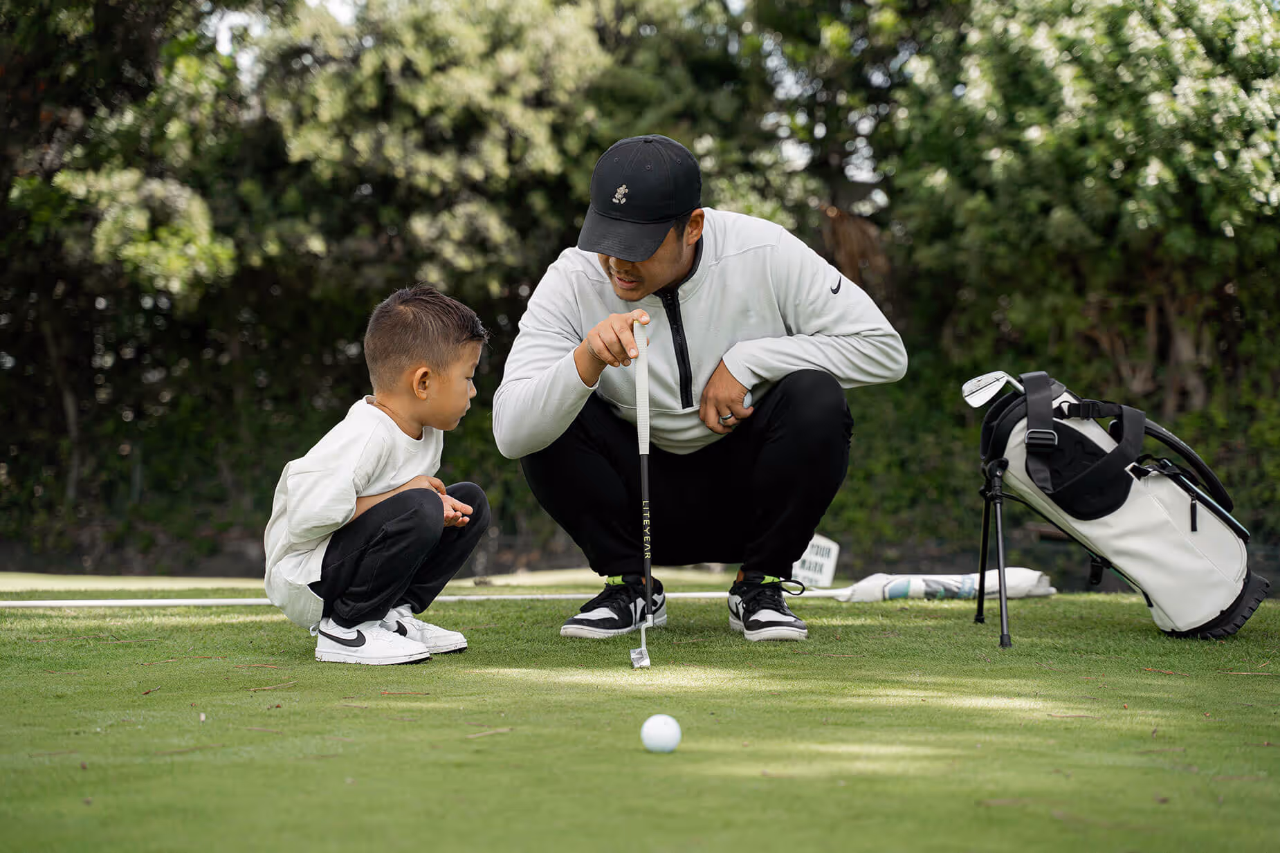 Father and son golfing with Liteyear clubs