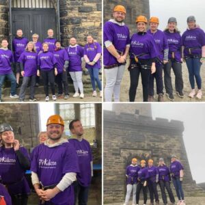 Partington's Holiday Park team abseil