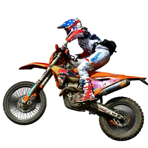 Motorcycle racer with USA helmet design rides an orange dirt bike in mid-air.
