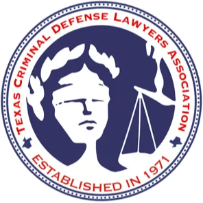 Seal of the Texas Criminal Defense Lawyers Association featuring a stylized Lady Justice holding scales, with the text 'Texas Criminal Defense Lawyers Association Established in 1971' around the edge.