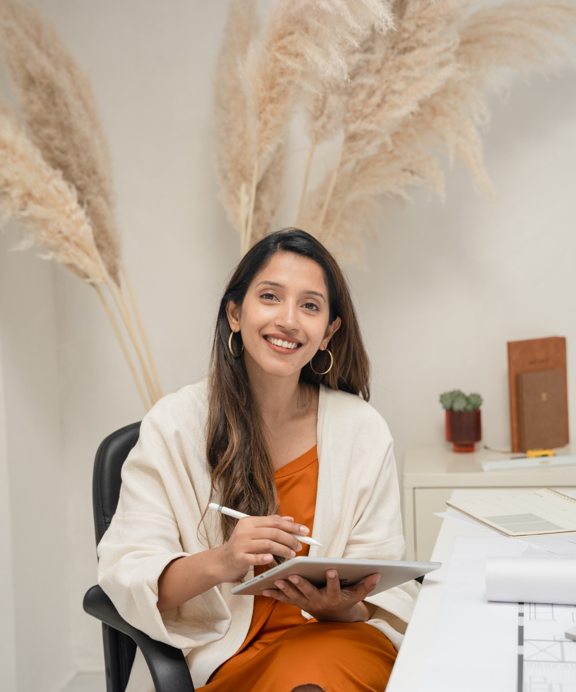 female founder on her ipad