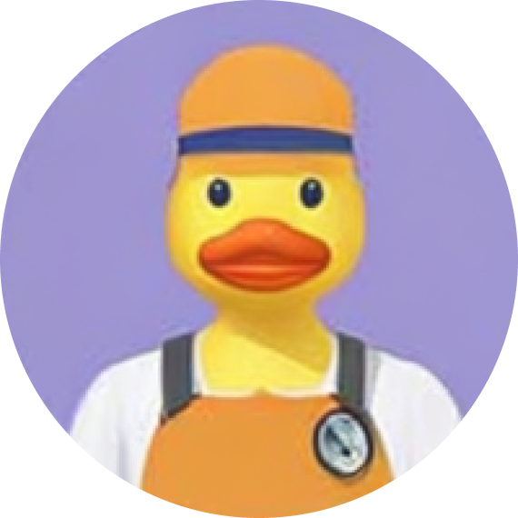 Yellow rubber duck wearing an orange cap, orange apron, and white shirt against a purple background.
