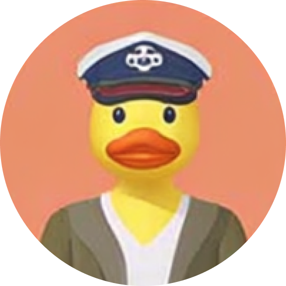 Cartoon yellow duck wearing a captain's hat and a green jacket over a white shirt.