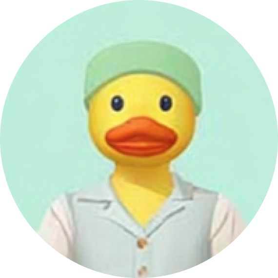 Yellow rubber duck wearing a light green beanie and light-colored shirt against a light teal background.