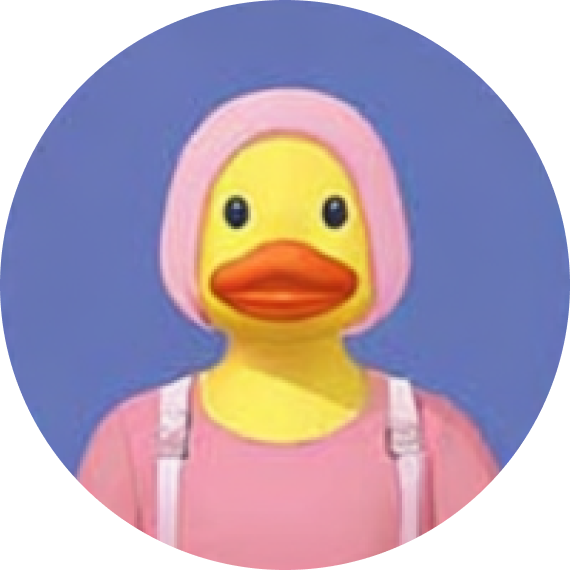 Yellow rubber duck wearing a pink bonnet and pink outfit against a blue background.