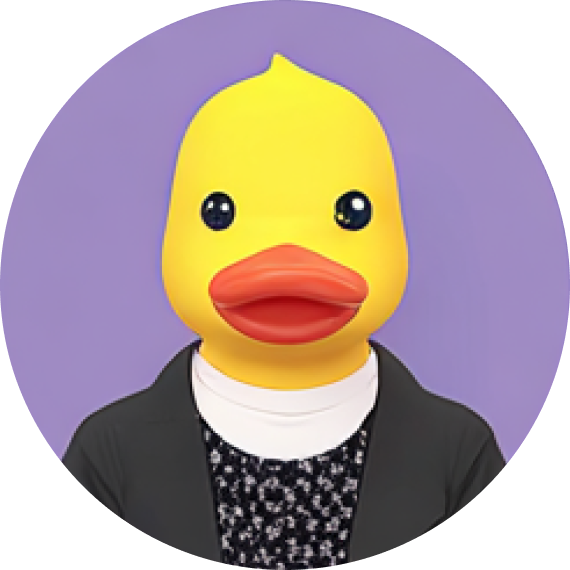 Person wearing a large rubber duck mask with a black jacket over a patterned shirt and a white turtleneck against a purple background.