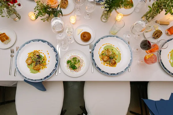 Seared scallops entrée prepared by Bartleby & Sage.