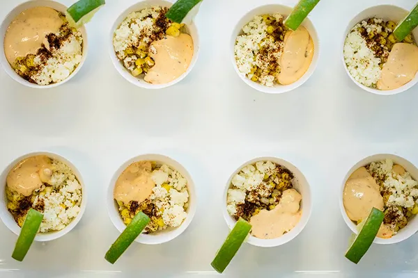 An elote-style bite served at an event catered by Bartleby & Sage