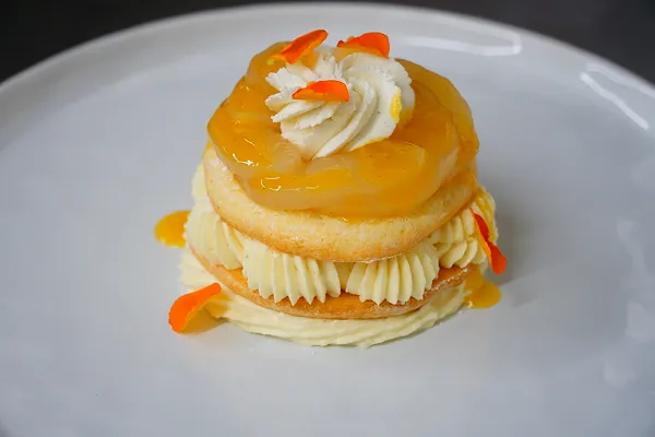 Passionfruit tiramisu stack created by the pastry chef at Bartleby & Sage