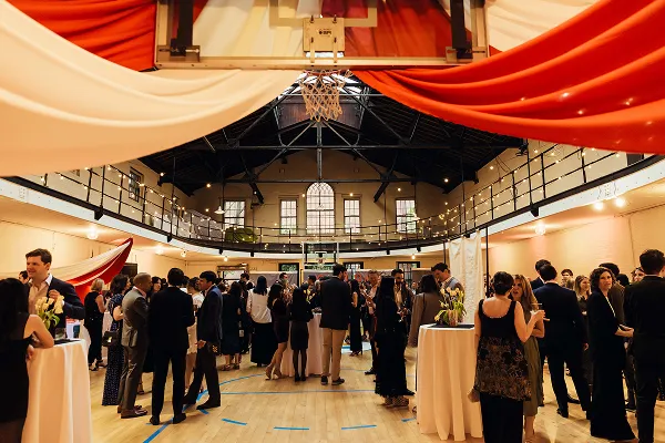 Guests mingling at the Plymouth Church gala catered by Bartleby & Sage