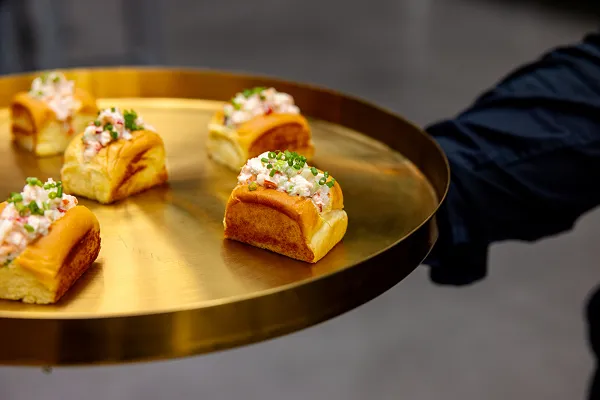 A Maine lobster roll served at a corporate event by Bartleby & Sage
