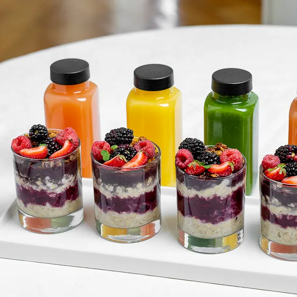 Yogurt fruit cups and fresh juice prepared for a corporate drop-off by Bartleby & Sage