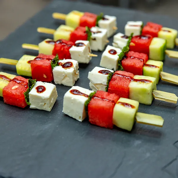 Watermelon caprese skewers served at a corporate event catered by Bartleby & Sage