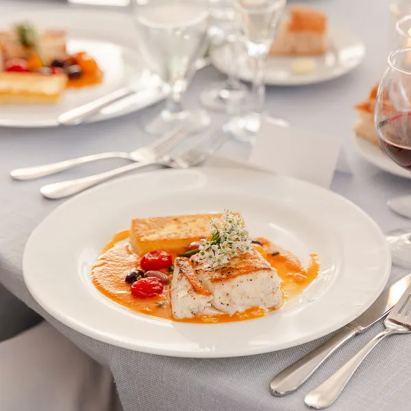 Pan-seared halibut plated by Bartleby & Sage