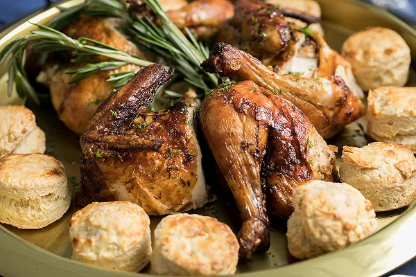 Chicken and biscuits plated by Bartleby & Sage