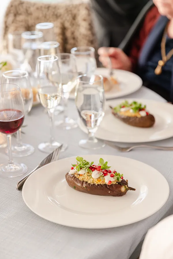 Stuffed eggplant plated by the Bartleby & Sage culinary team