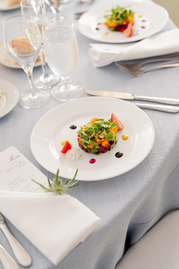 A close-up of apple beet tartare plated by the Bartleby & Sage culinary team