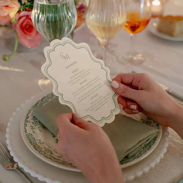A styled menu card for a wedding planned by Bartleby & Sage.