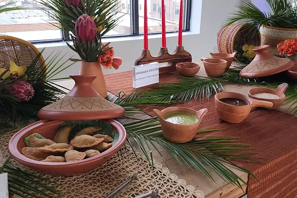 An empanada station catered by Bartleby & Sage.