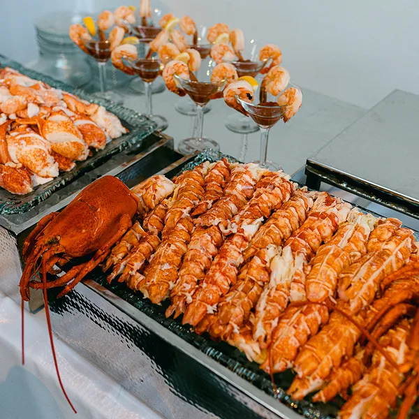 A lobster and shrimp raw bar catered by Bartleby & Sage.