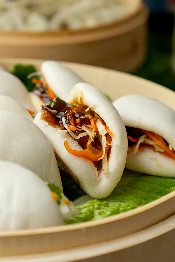 Korean pork bao buns served at a station catered by Bartleby & Sage.