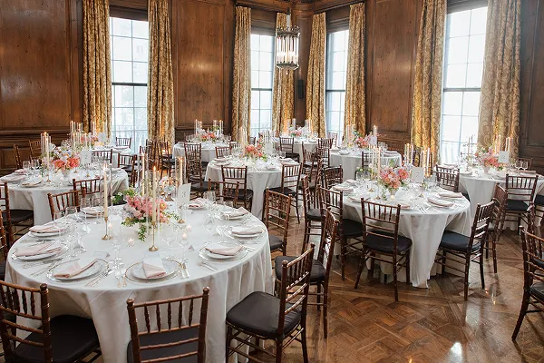 Table settings at Harold Pratt House for a wedding catered by Bartleby & Sage.