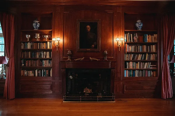 The fireplace in the library at Wainwright House.