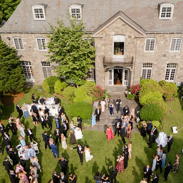 Guests on the lawn at a wedding styled by Bartleby & Sage at Wainwright House.