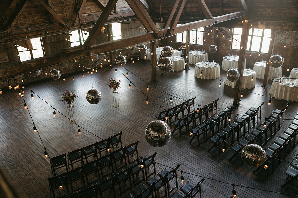 Greenpoint Loft decorated with disco balls for an event catered by Bartleby & Sage.