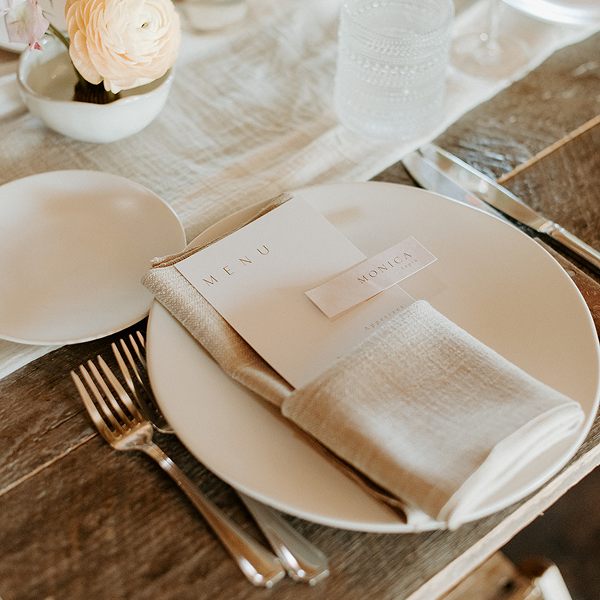 A styled menu card for a wedding planned by Bartleby & Sage.