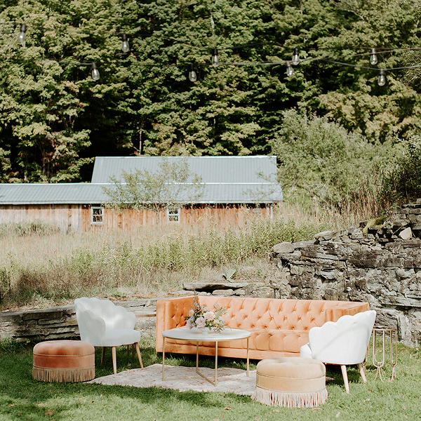 Rental furniture styled by Bartleby & Sage for a barn wedding.