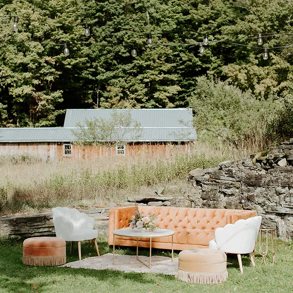 Rental furniture styled by Bartleby & Sage for a barn wedding.