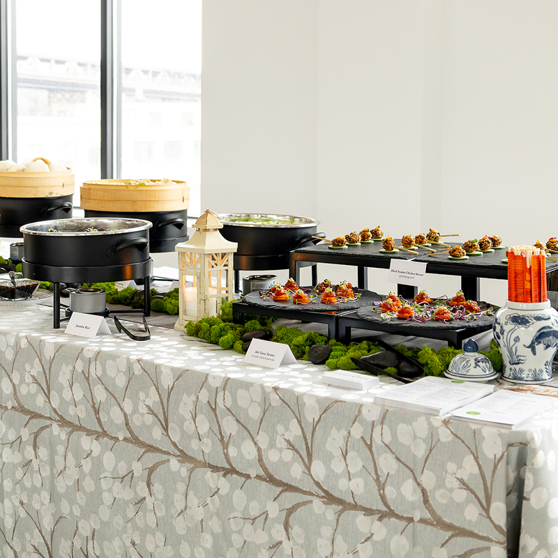 A Dim Sum station set up for a corporate event by Bartleby & Sage.
