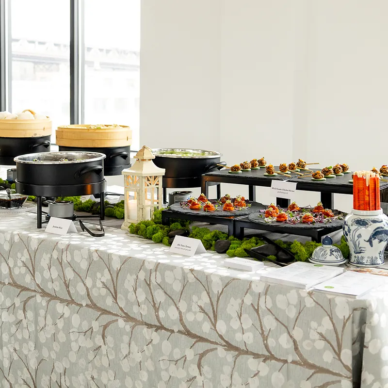 A Dim Sum station set up for a corporate event by Bartleby & Sage.