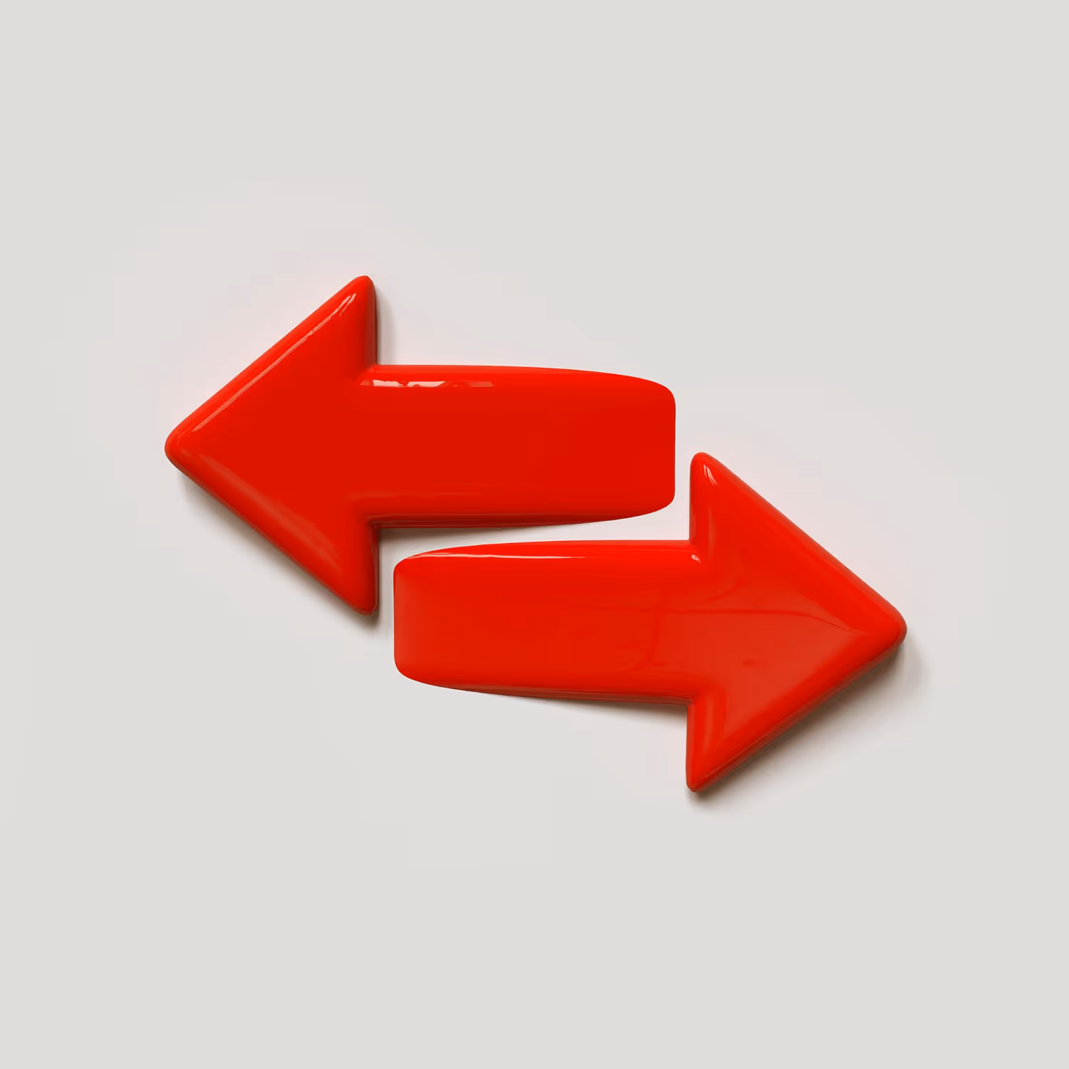 Two shiny red arrows pointing in opposite directions on a light gray background.