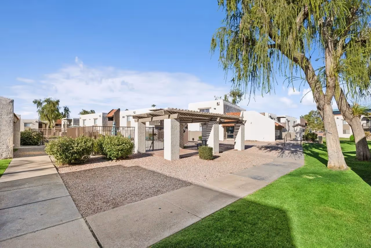 Exterior with picnic area featuring cabana with table