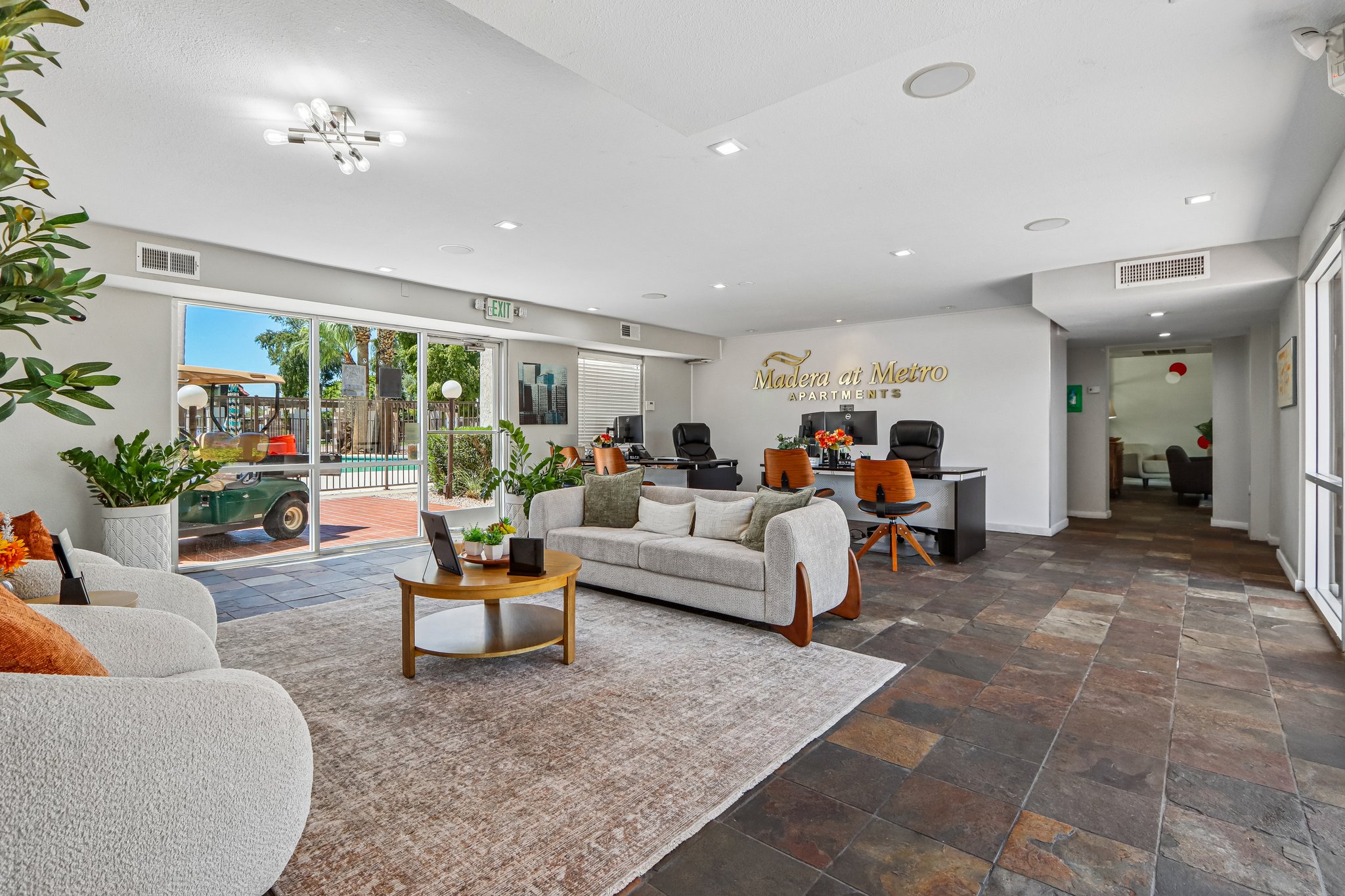 Leasing office with desks and seating area