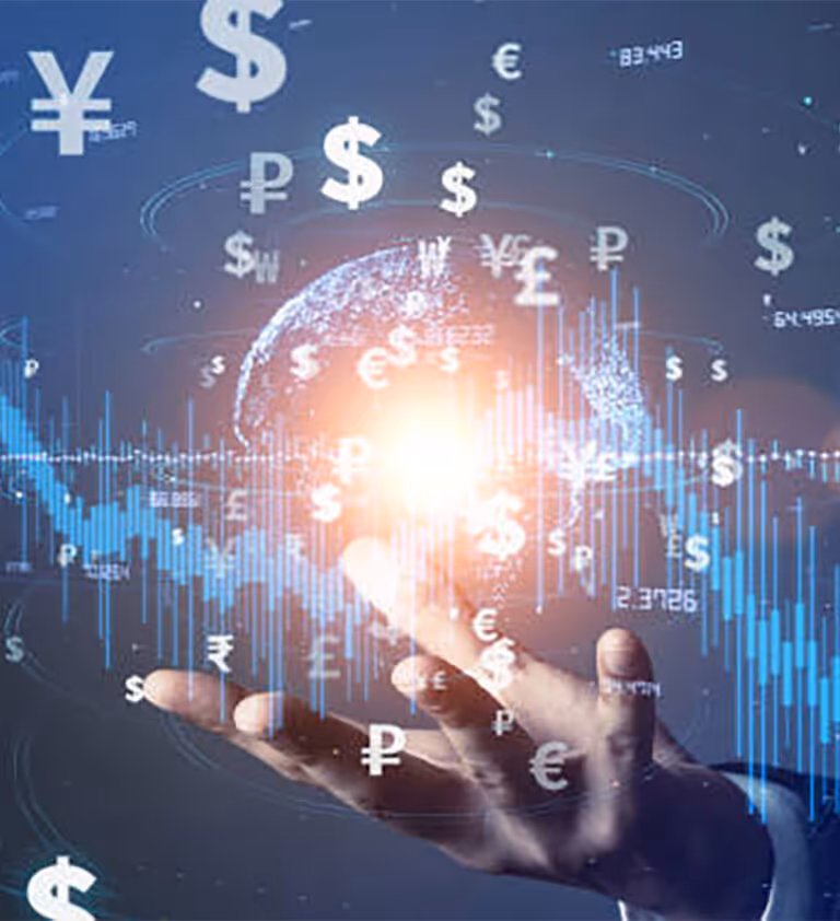 Hand holding glowing globe with floating currency symbols and blue financial graphs.
