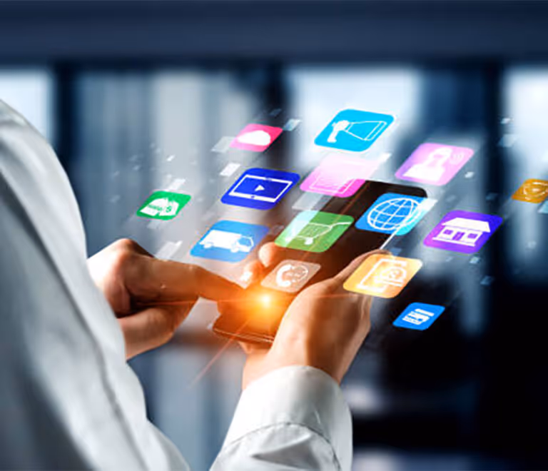 Person using smartphone with colorful digital app icons floating above the screen.