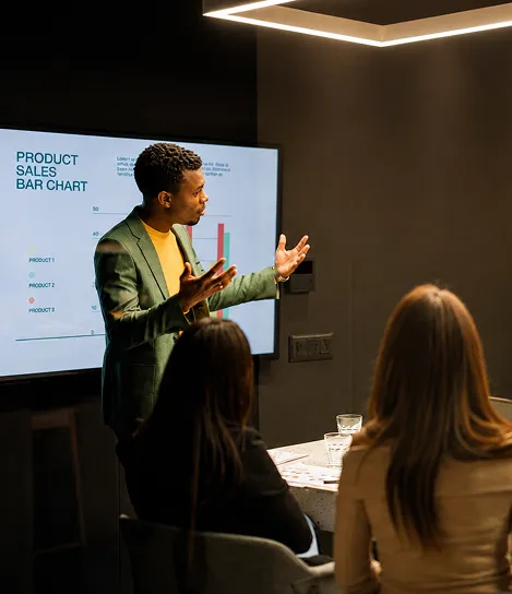 A man giving a presentation to a group of people.