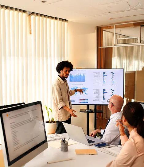 A man giving a presentation to a group of people.
