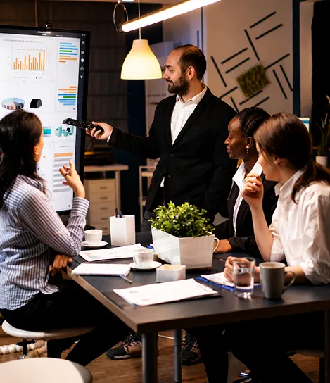 A man giving a presentation to a group of people.