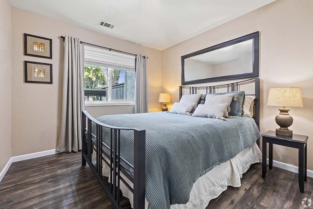 Furnished bedroom with window