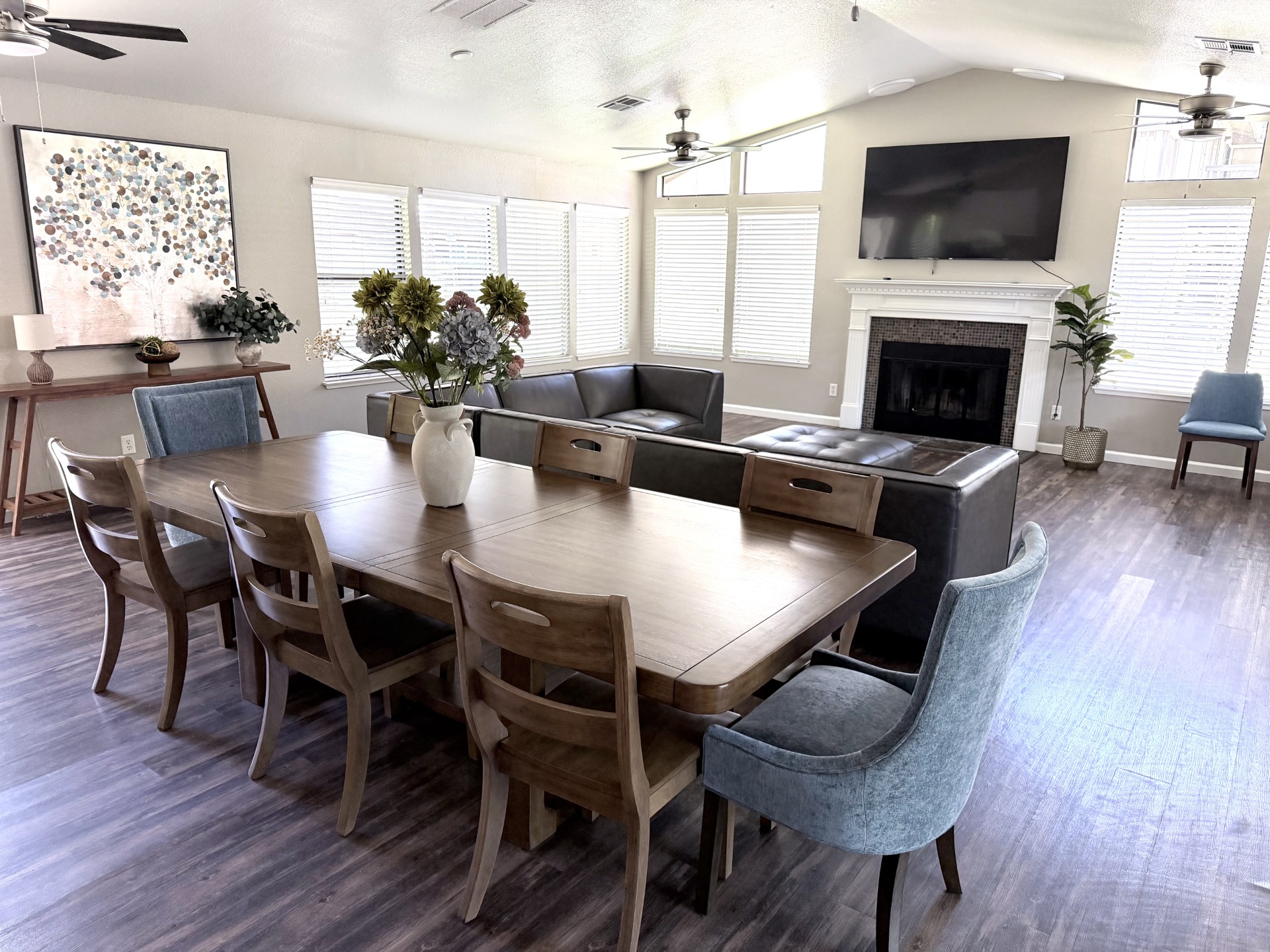 Resident lounge with seating near fireplace