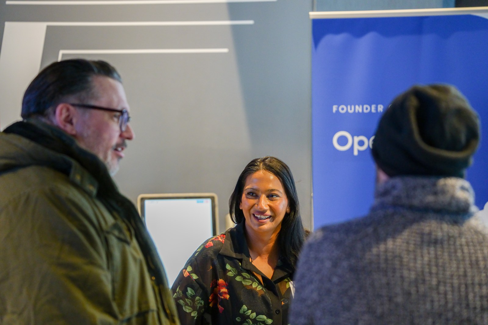 Networking at the OpenCircle banner